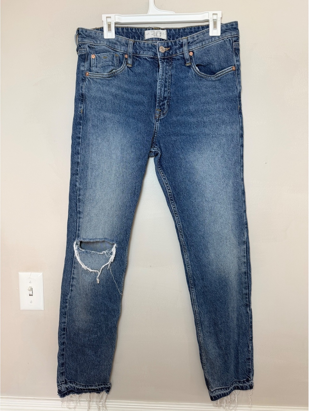 Free People We The Free Boyfriend Jeans with distressing and raw hem. Size 30